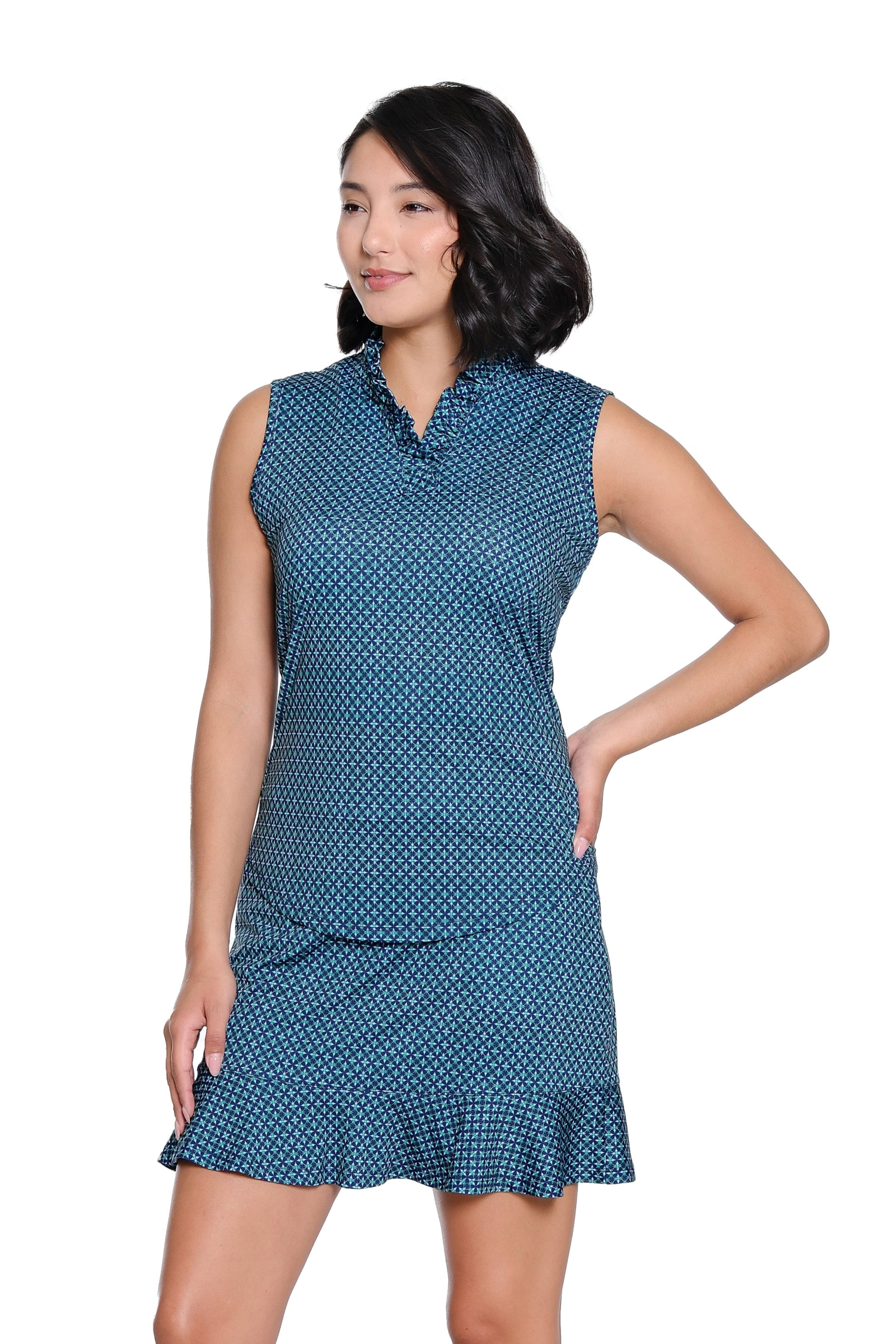 Woman wearing a blue polka dot dress on a white background